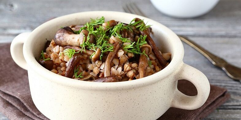 Buckwheat porridge with mushrooms for lunch in the healthy nutrition menu